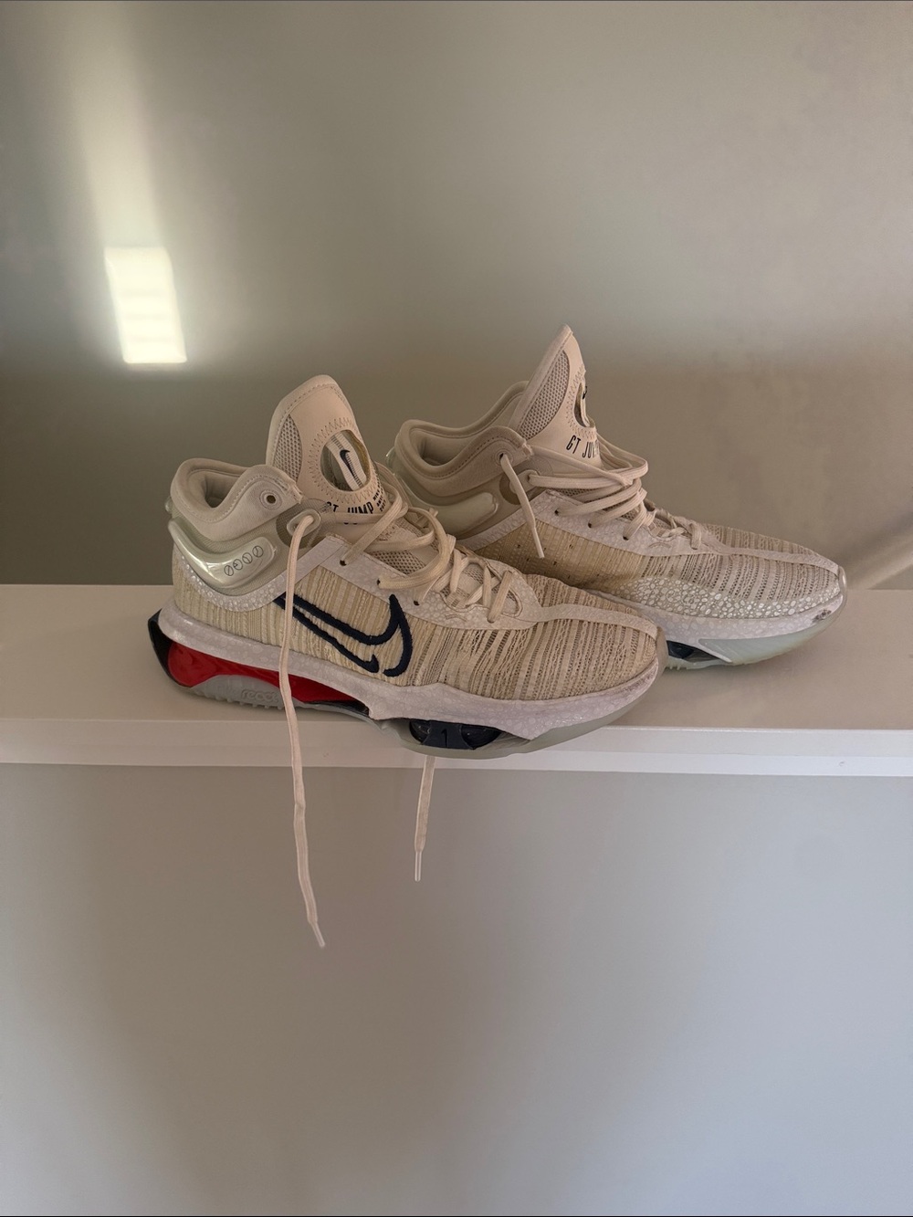 Nike Basketball Shoes with Black Swoosh and Red Accent